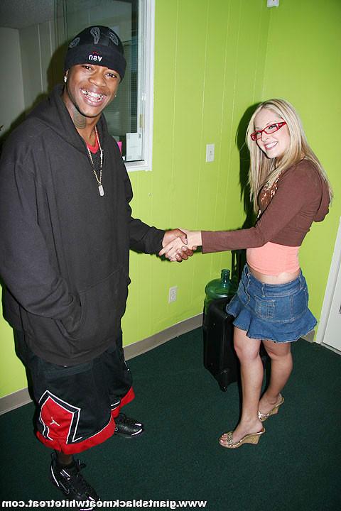 16P babe in glasses sucks and strokes a massive black dong