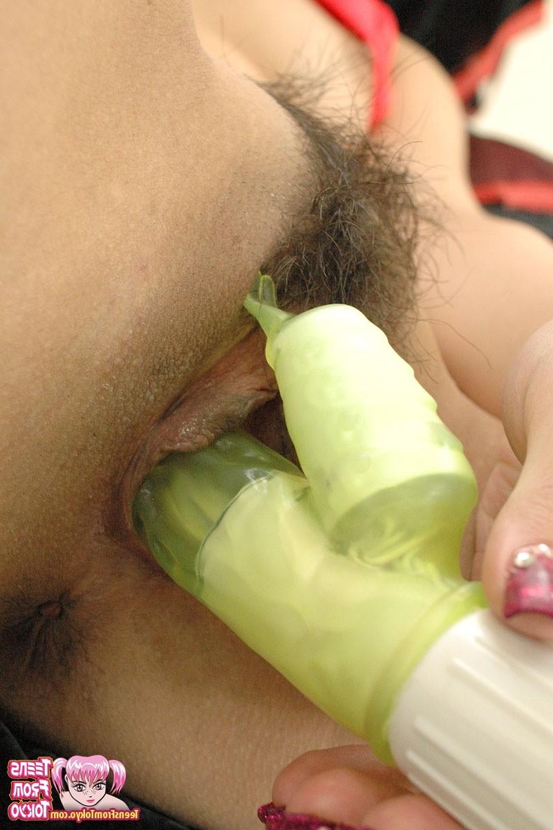14P Asian teenie puts a dildo in her extremely hairy snatch