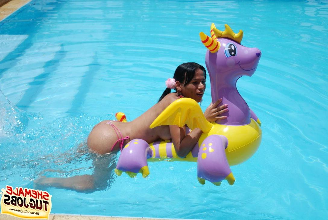 11P Sexy shemale playing with her cock poolside!