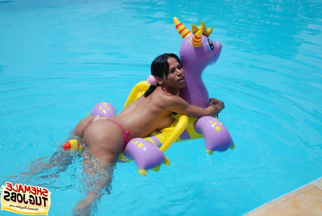 11P Sexy shemale playing with her cock poolside!