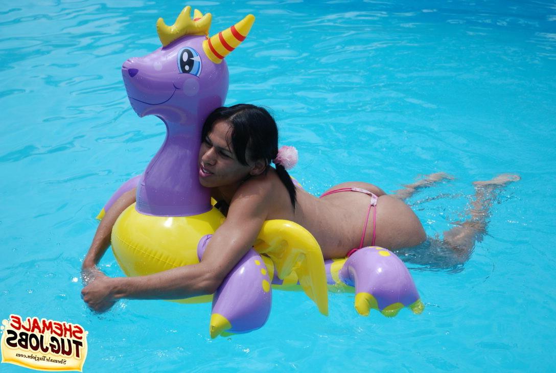 11P Sexy shemale playing with her cock poolside!