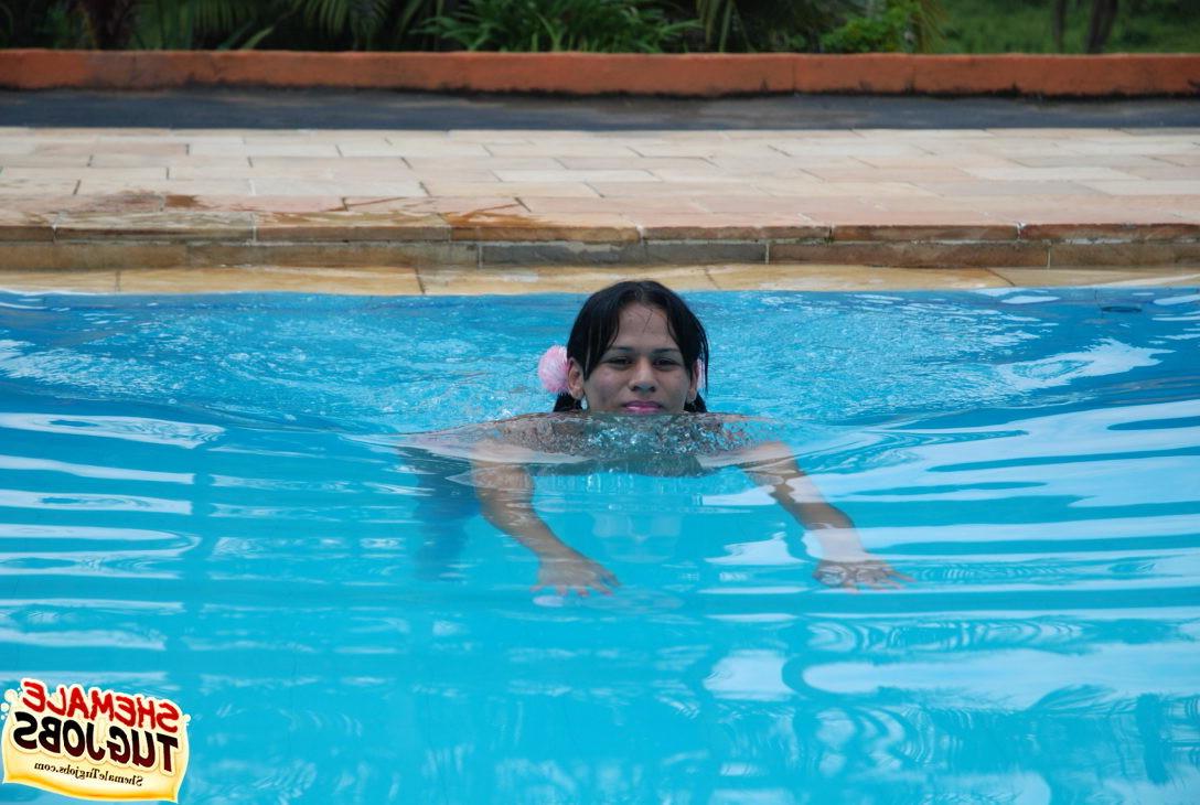 11P Sexy shemale playing with her cock poolside!