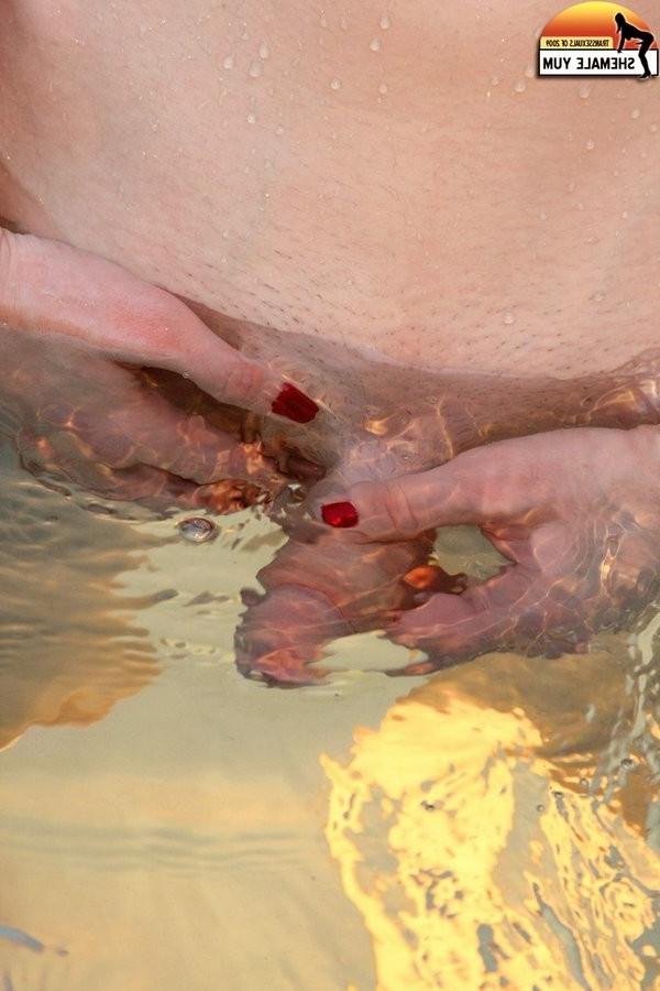 16P Slender American Shemale Strokes Her Cock In A Jacuzzi