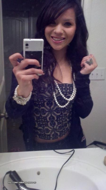 14P Naughty Spanish chick stripping naked while selfshooting