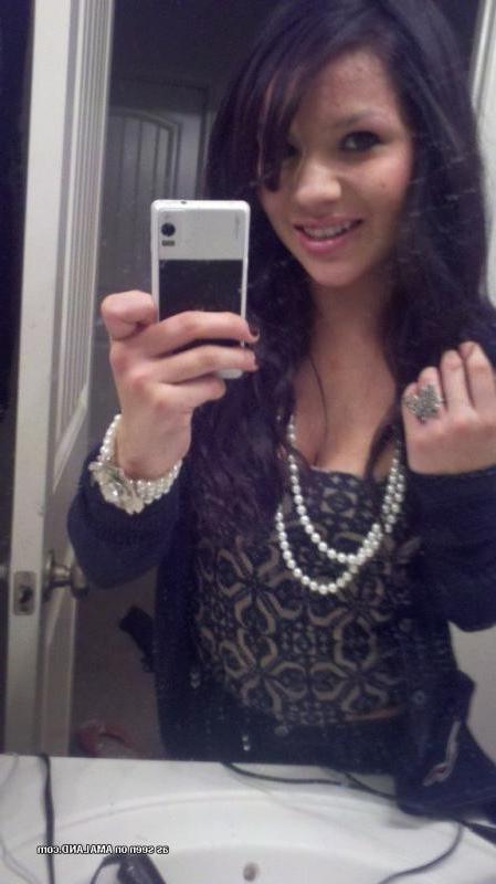 14P Naughty Spanish chick stripping naked while selfshooting
