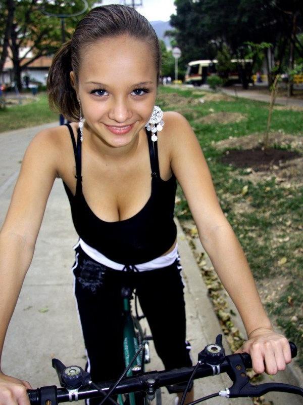 16P Paris Milan riding a bicycle showing cleavage