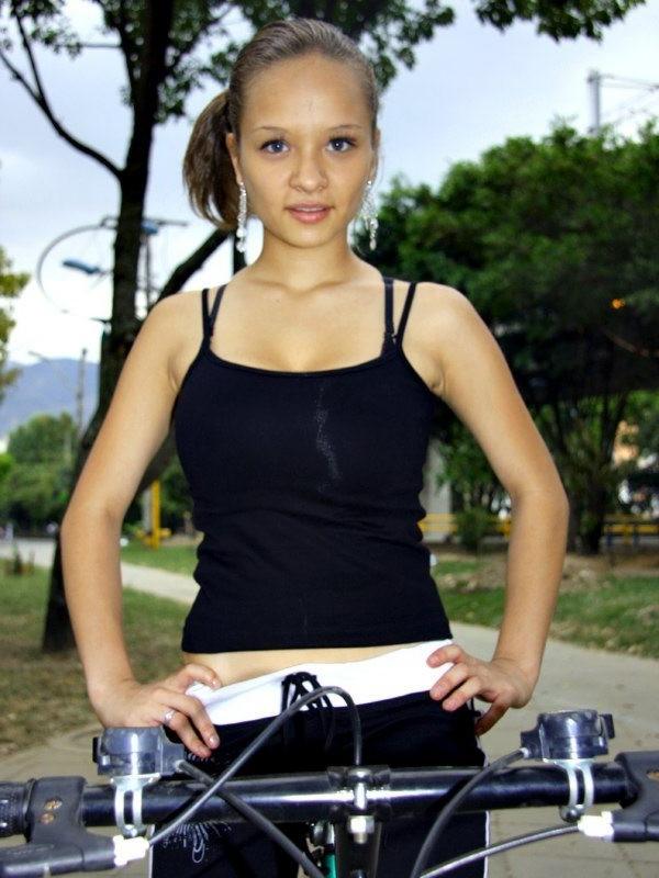 16P Paris Milan riding a bicycle showing cleavage