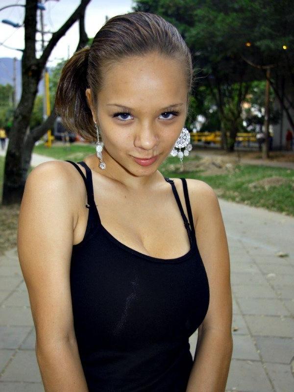 16P Paris Milan riding a bicycle showing cleavage