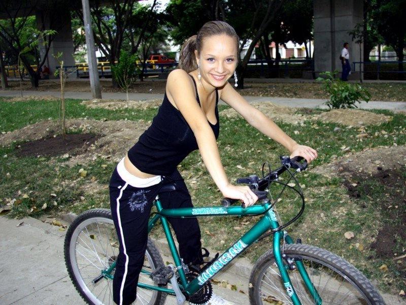 16P Paris Milan riding a bicycle showing cleavage