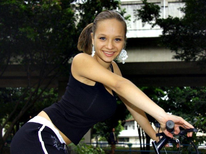 16P Paris Milan riding a bicycle showing cleavage