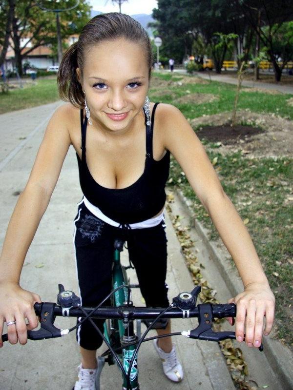 16P Paris Milan riding a bicycle showing cleavage