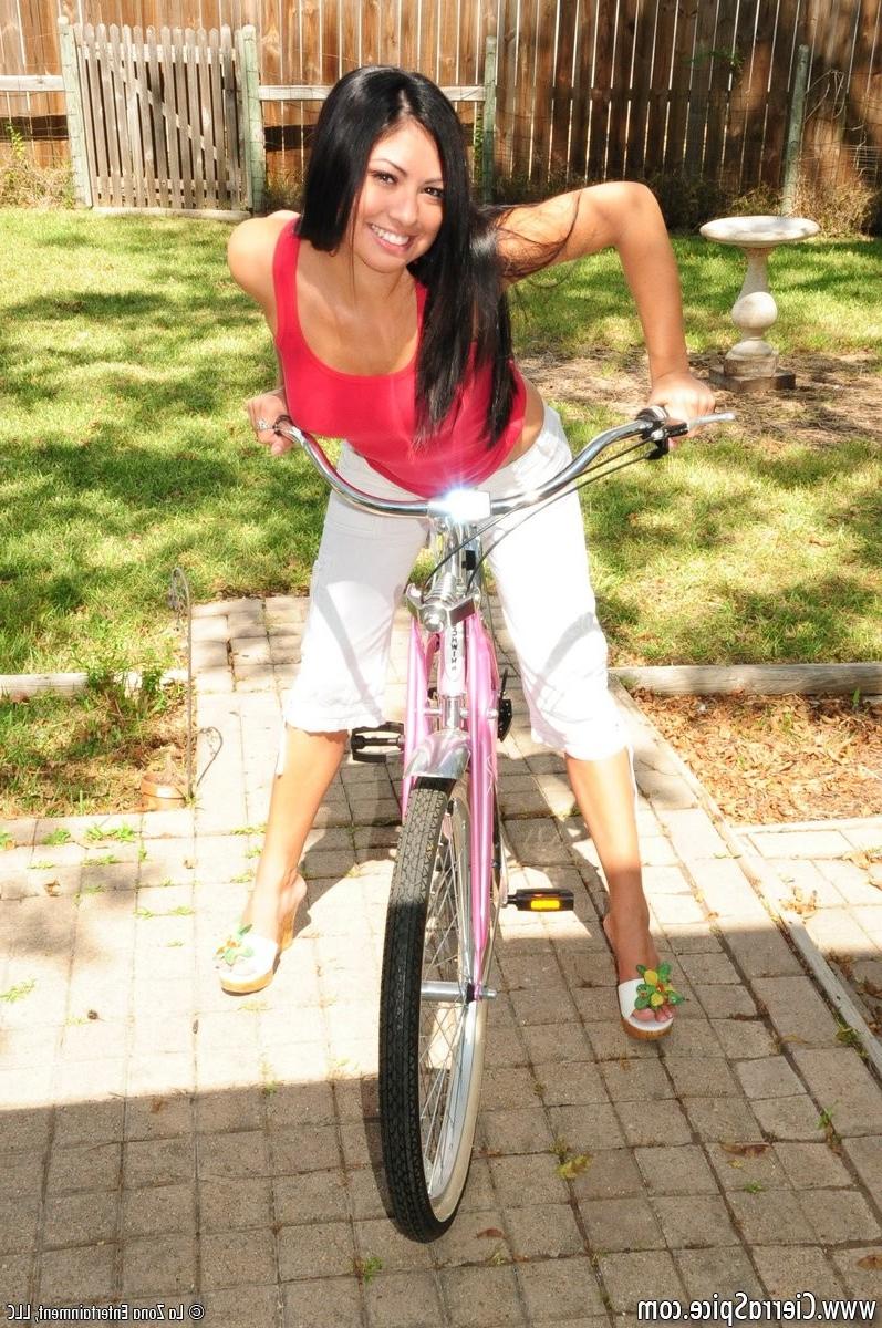 16P American Latina teen girl rides bike topless