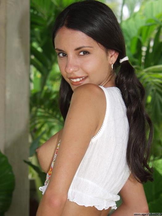 15P Mindy Vega pops out her perky latina tits