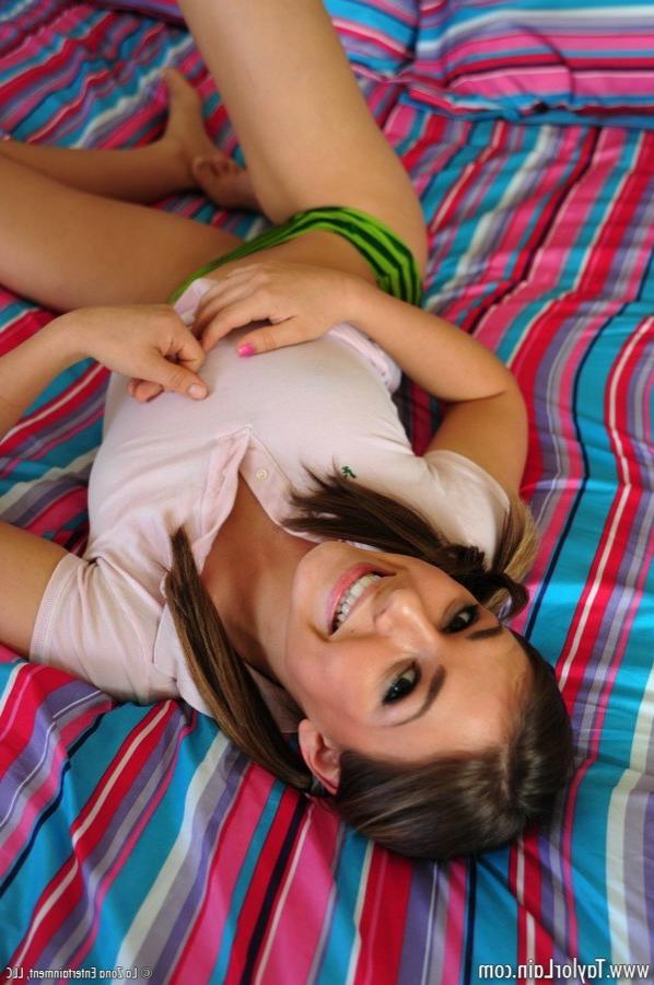 12P Taylor masturbates with her legs behind her head