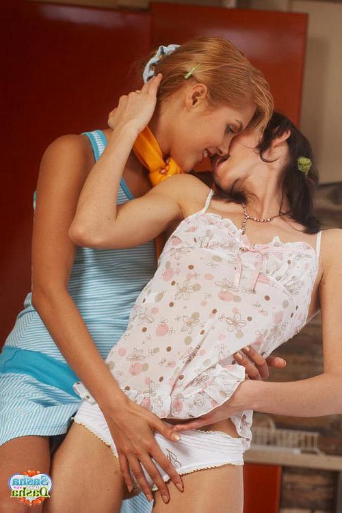 17P Young attractive lesbian couple kissing and teasing each other
