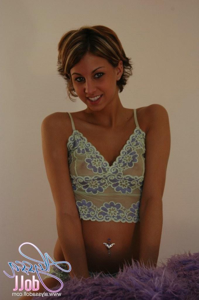 15P Sexy teen in lingerie shows us her perky titties