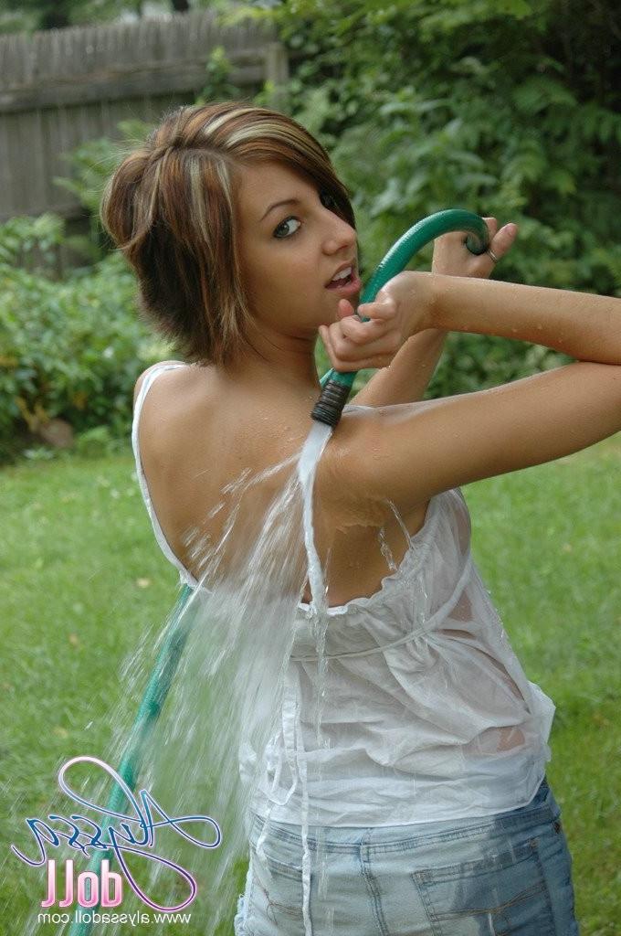 15P Perky breasted teen in a see-thru tank top