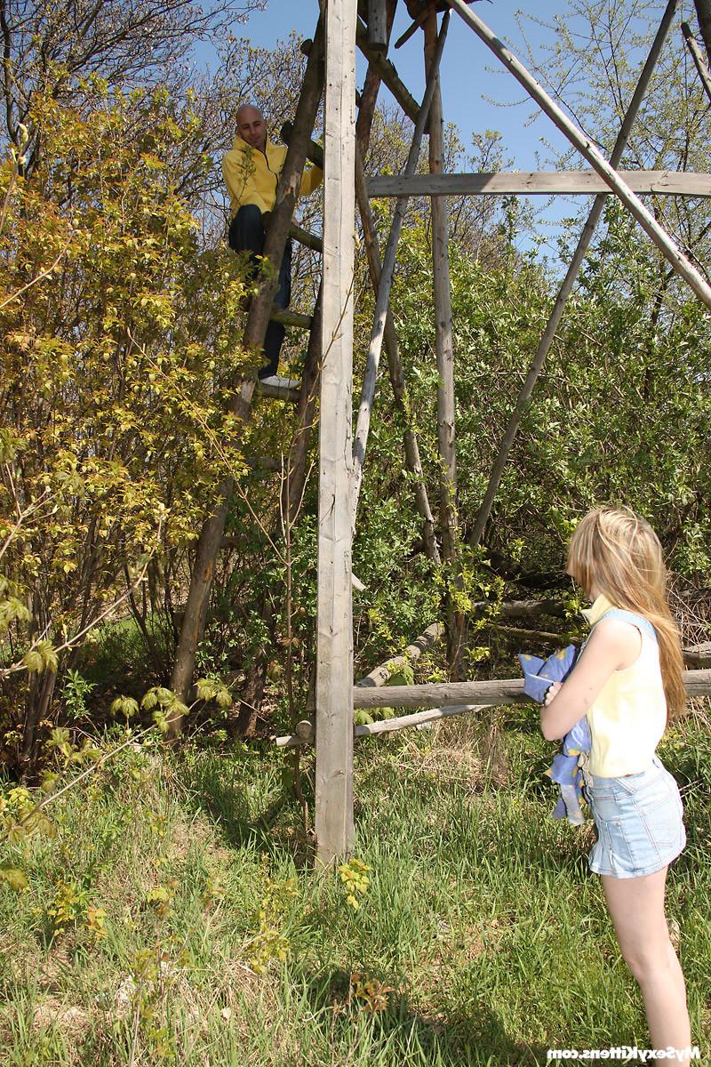 14P Petite babe trying rockhard erection in the bushes