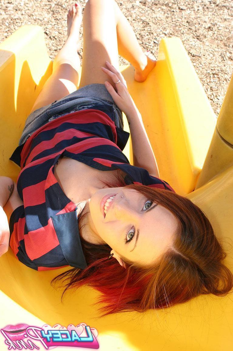 18P Redhead teen flashing her perky tits at playground
