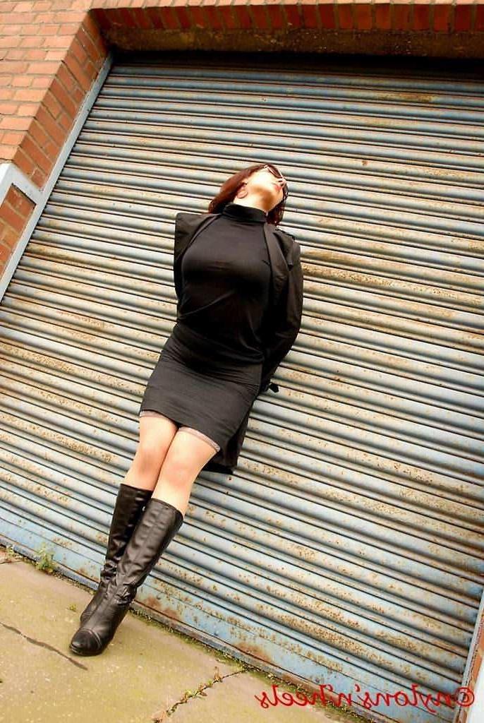 12P Redhead Lady Justine in stockings and boots