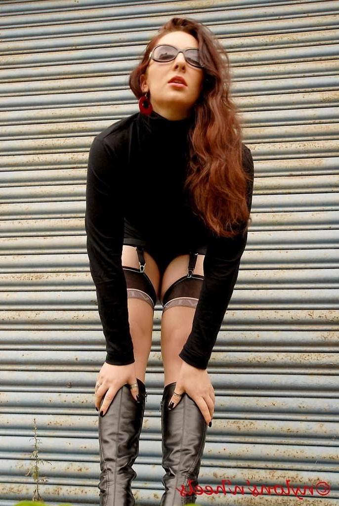 12P Redhead Lady Justine in stockings and boots