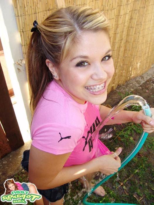 16P Teen Topanga gets herself all hot and wet with the garden hose