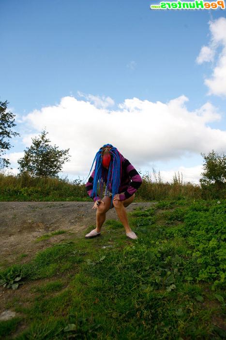 16P Naughty teen with a pink and blue hair caught peeing