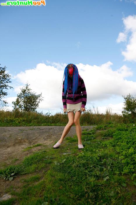 16P Naughty teen with a pink and blue hair caught peeing