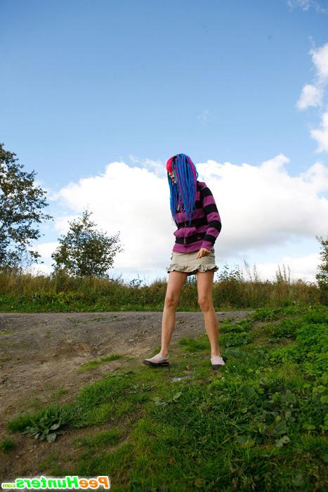 16P Naughty teen with a pink and blue hair caught peeing