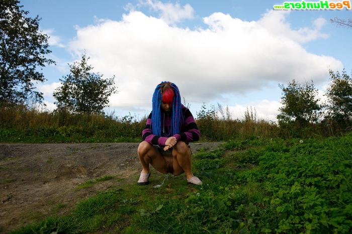 16P Naughty teen with a pink and blue hair caught peeing