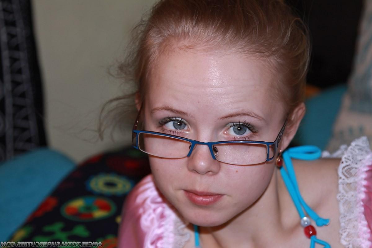 16P Tiny teen girl naked wearing glasses