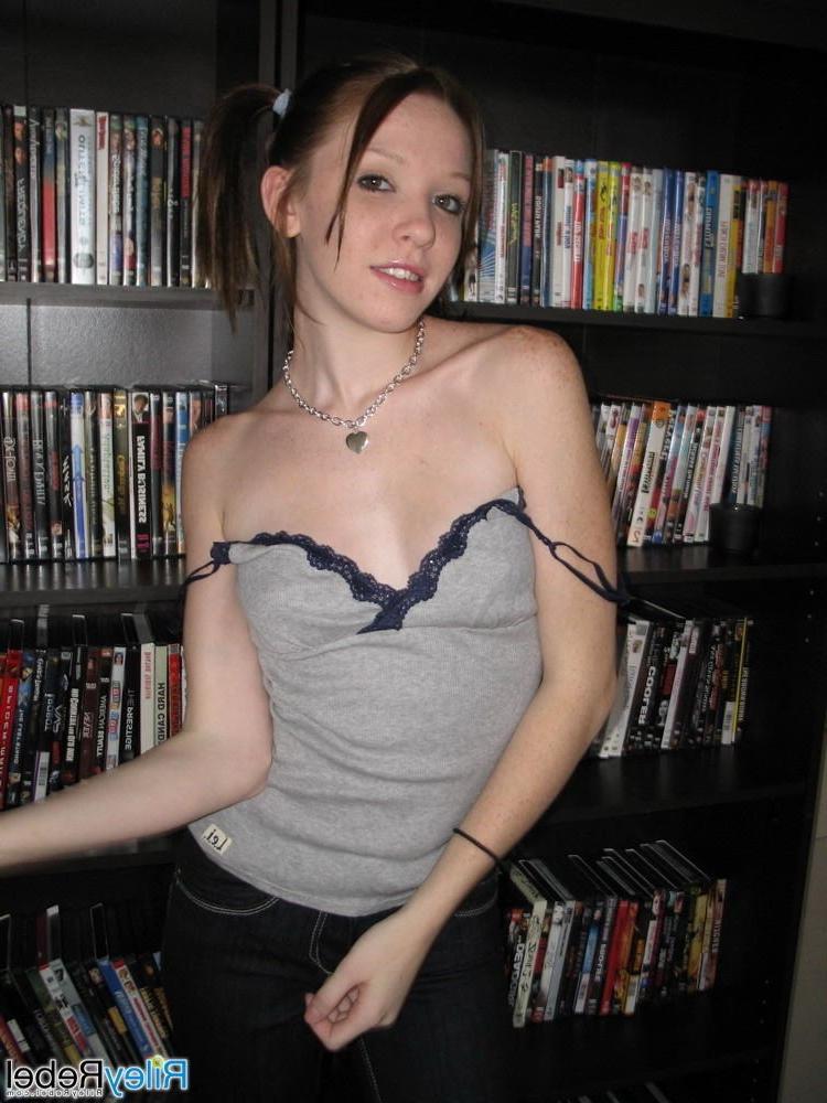 15P Small titted petite eighteen year old Riley Rebel strips naked