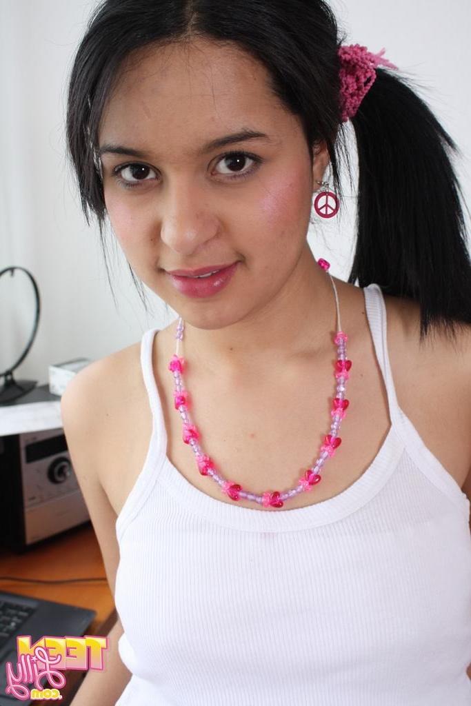 15P Eighteen year strips at computer to show cute ass and perky tits