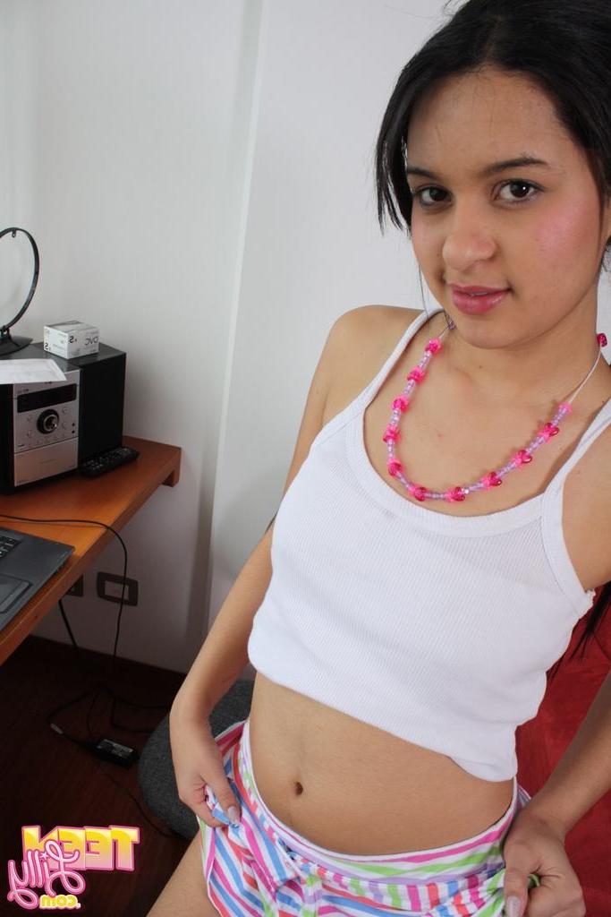 15P Eighteen year strips at computer to show cute ass and perky tits