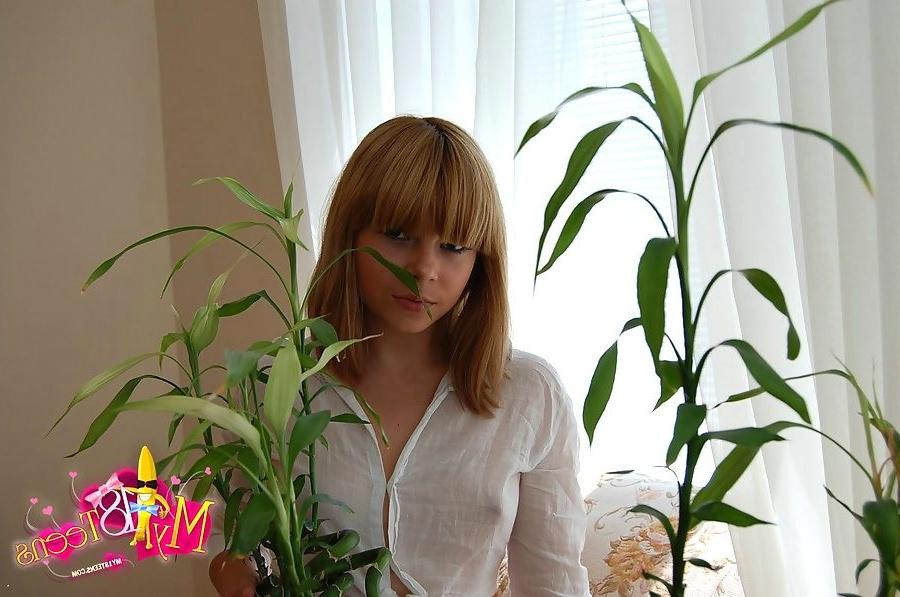 16P petite blonde teen next door fully undressing herself on a sofa