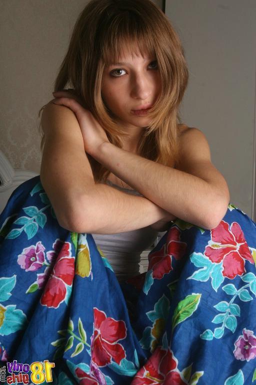 15P Skinny little teen plays with her big tits