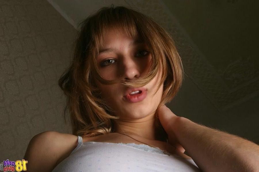 15P Skinny little teen plays with her big tits