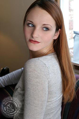 15P Redheaded cutie shows you her perky boobies