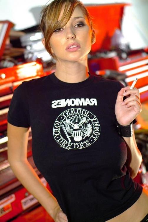15P Shay Laren enjoys a smoke in the garage
