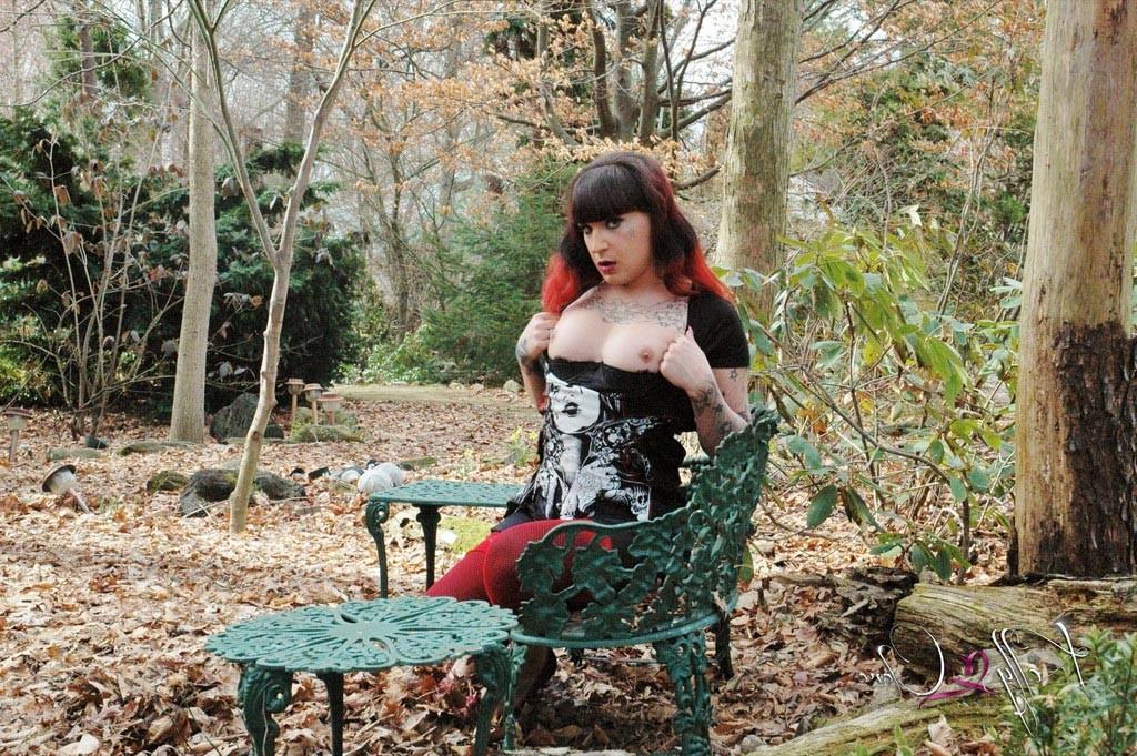12P TS Kelly Clare stripping in the garden