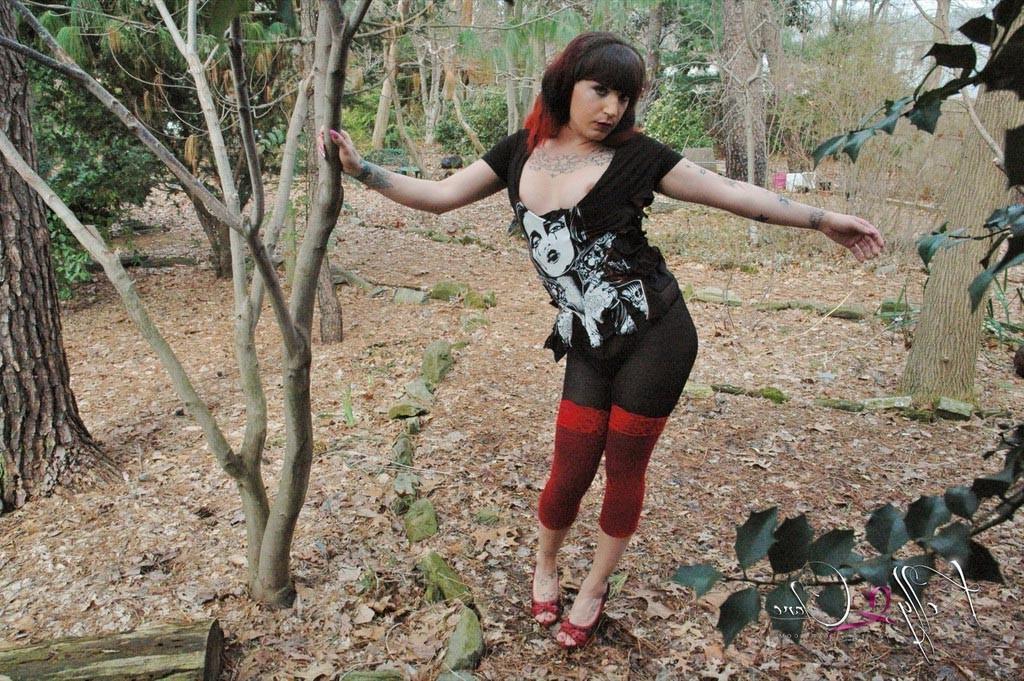 12P TS Kelly Clare stripping in the garden