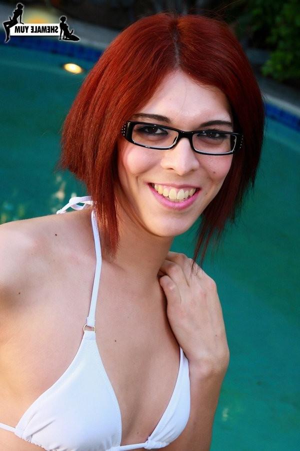 15P Shemale Hottie In Glasses Strokes Her Hard Shaved Cock