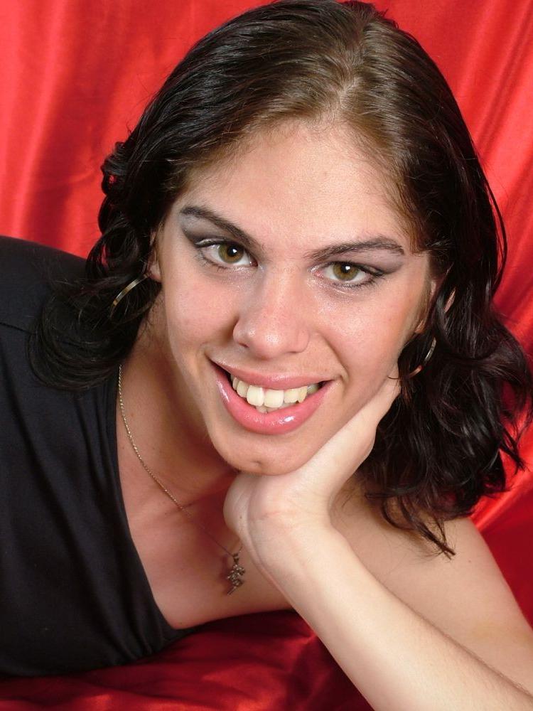 17P Smiling Shemale Takes Off Skirt And Displays Perky Ass