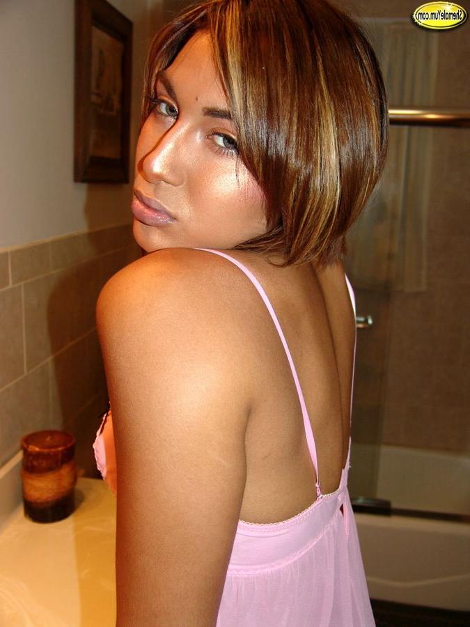 15P Cute feminine shemale with a massive hard cock