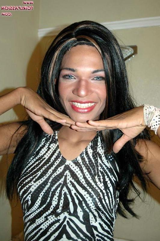 14P Beautiful and tall ebony shemale with a big cock