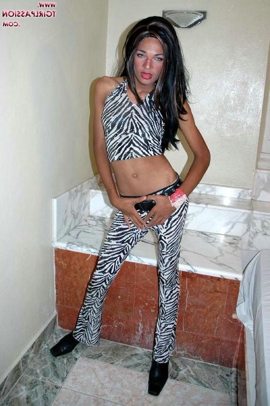 14P Beautiful and tall ebony shemale with a big cock