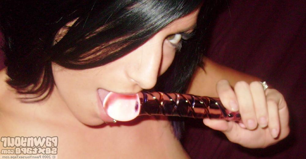 15P Babe takes a large glass dildo and shoves it in her twat for her BF to see.