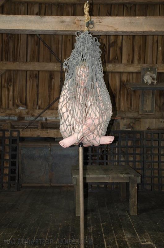 12P Phoenix Rising blonde in bondage with discipline and corporal punishment in dark