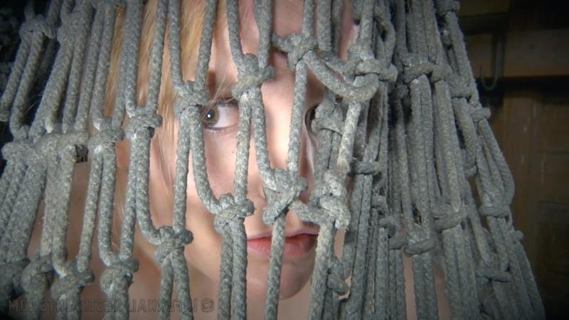 12P Phoenix Rising blonde in bondage with discipline and corporal punishment in dark