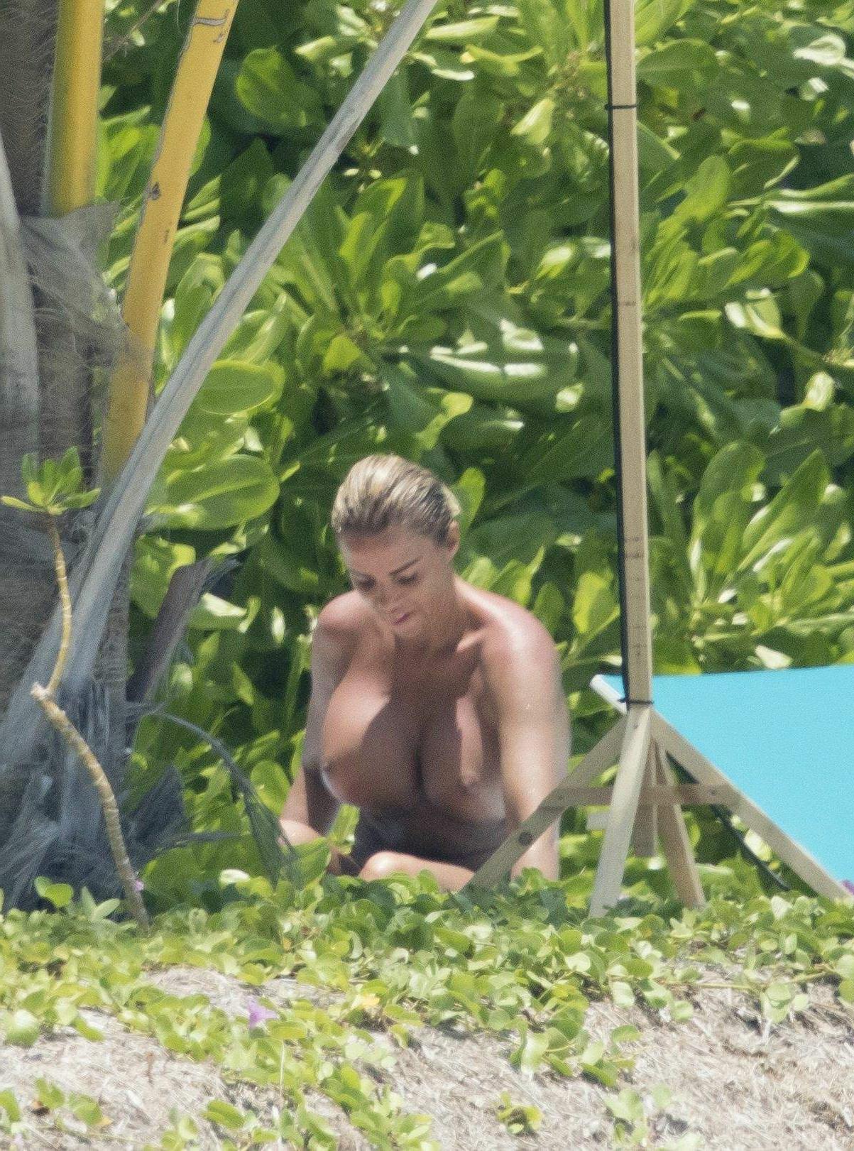 16P Katie Price’s Massive Boobs Enjoy The Sun